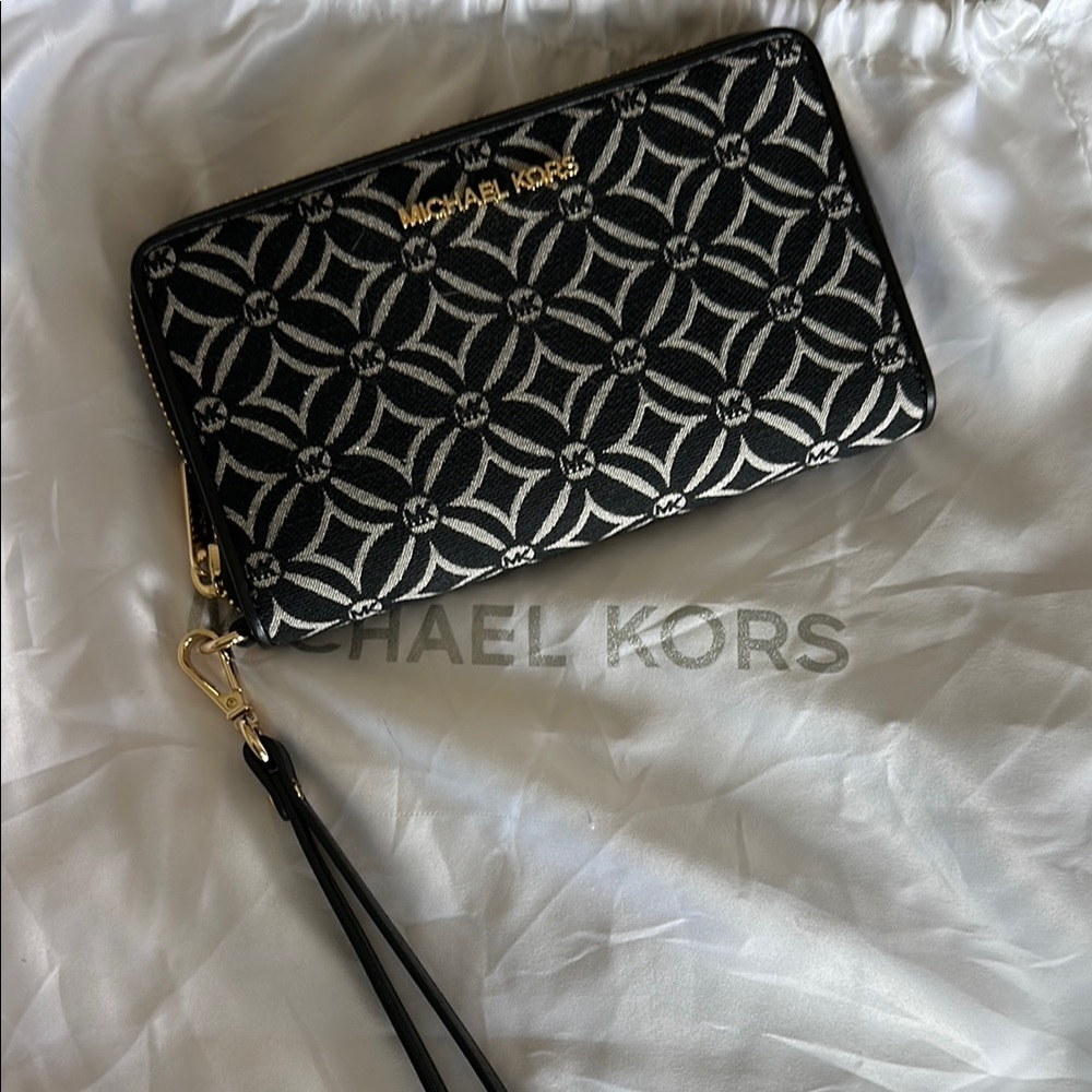Michael Kors Black and White Wallets with Monogram Pattern